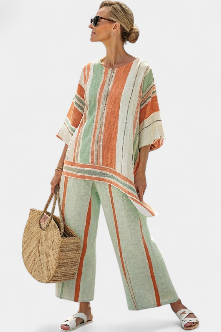 Elegante conjunto de blusa asimétrica a rayas de lino y bambú y pantalones de pierna ancha para un estilo sofisticado.