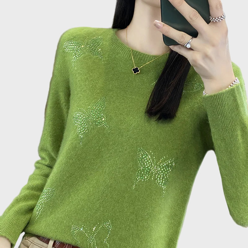 Cuello alto de punto con diseño de mariposa