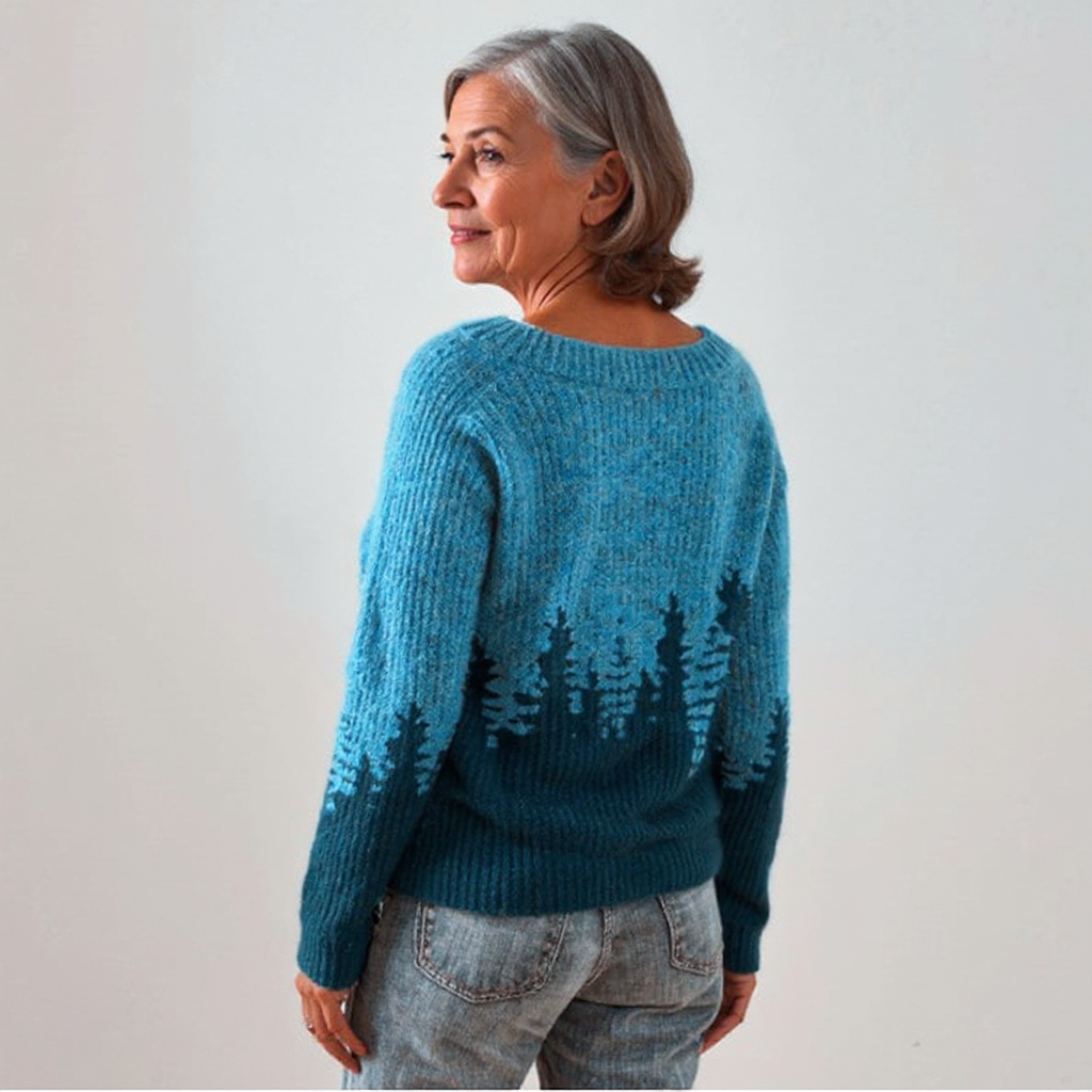 Blusa de punto con estampado inspirado en el bosque