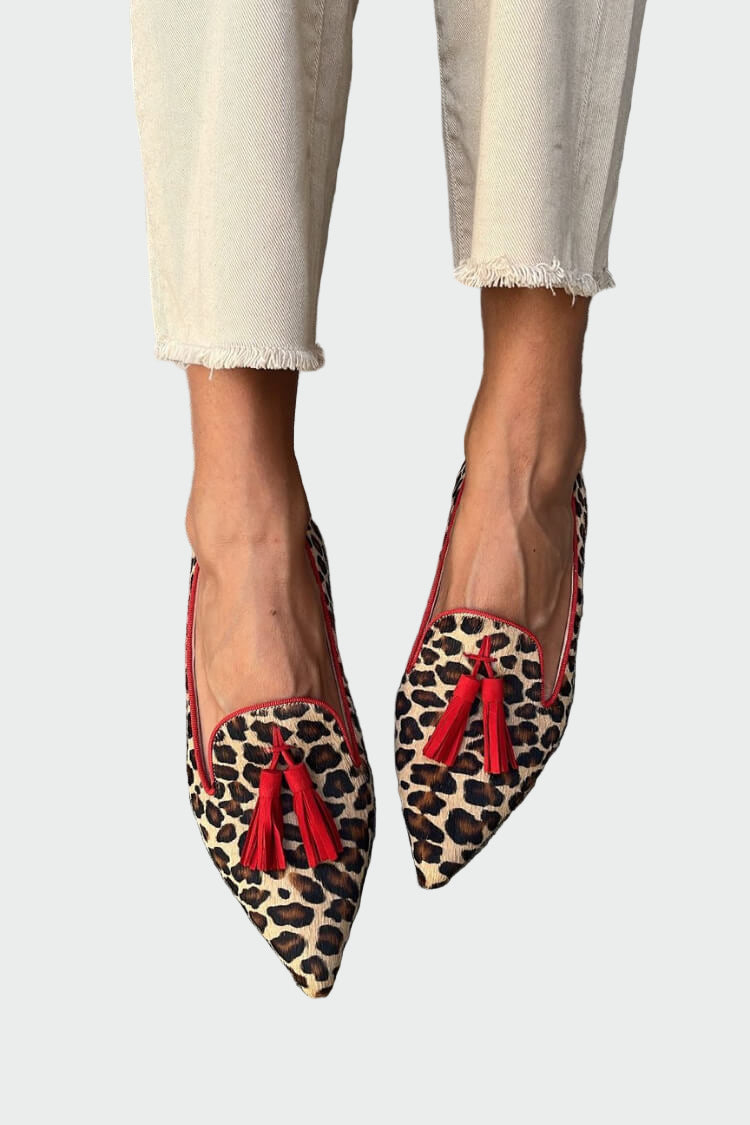 Mocasines de punta puntiaguda con detalles de flecos