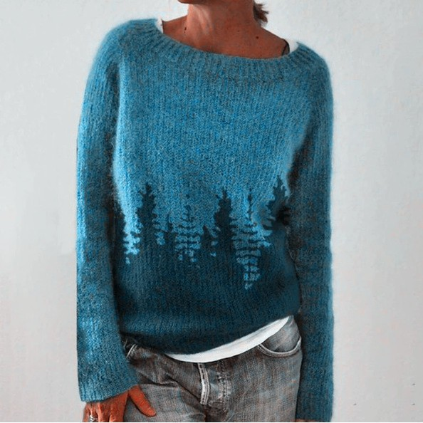 Blusa de punto con estampado inspirado en el bosque