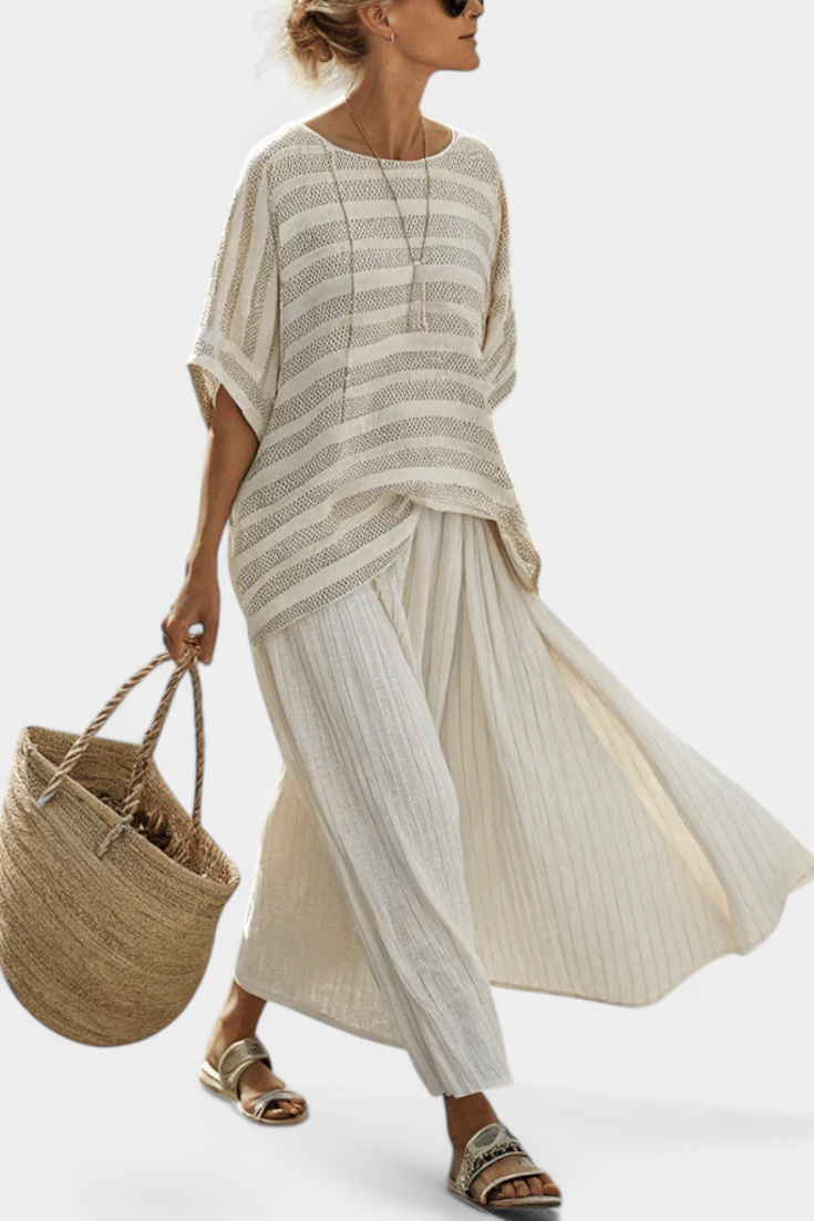 Conjunto de margaritas de lino y bambú con elegante top de rayas y pantalones fluidos para un estilo moderno y cómodo.