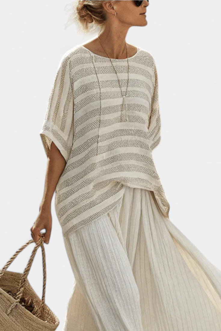 Conjunto de margaritas de lino y bambú con elegante top de rayas y pantalones fluidos para un estilo moderno y cómodo.