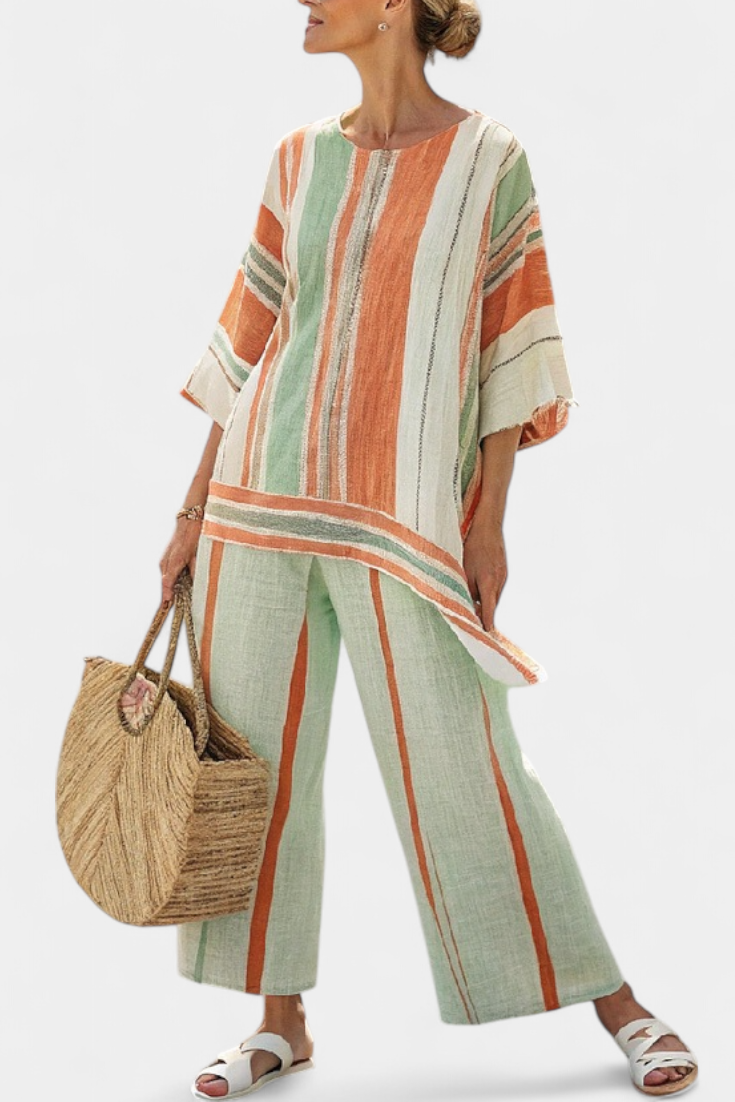 Elegante conjunto de blusa asimétrica a rayas de lino y bambú y pantalones de pierna ancha para un estilo sofisticado.