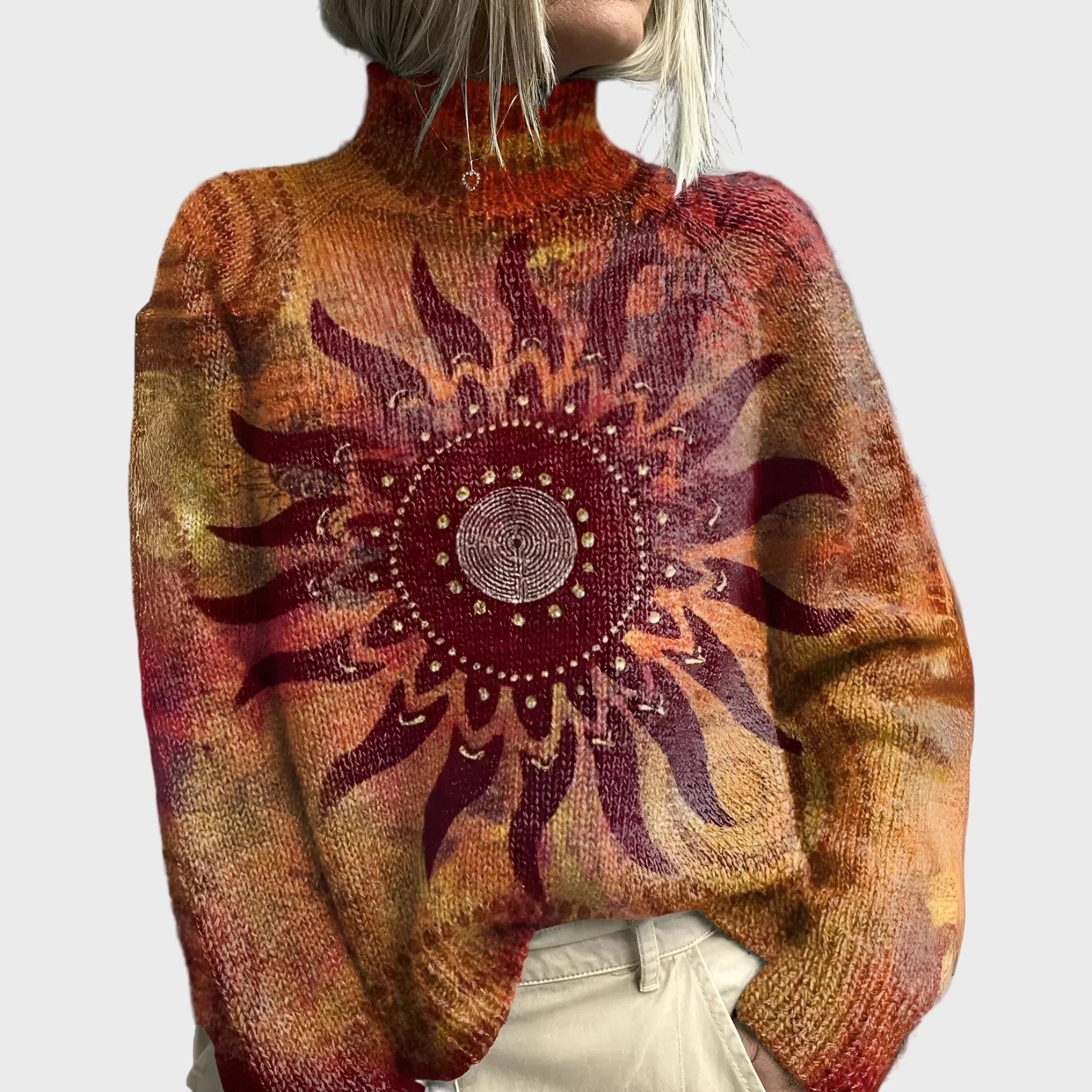 Cuello alto de punto con diseño de sol y tribal